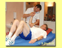 Physiotherapeut mit Patient